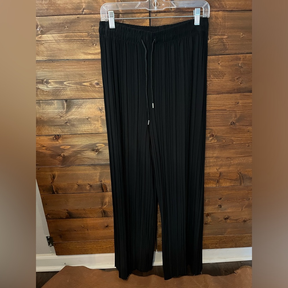 Black pleated flowy pants